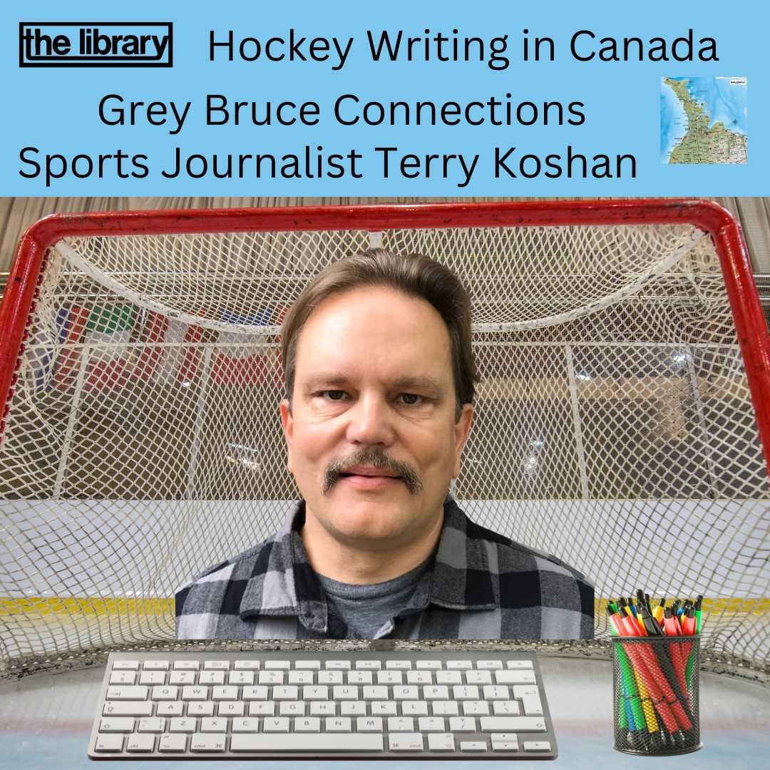 Author Terry Koshan in front of a hockey net with keyboard and cup of pens